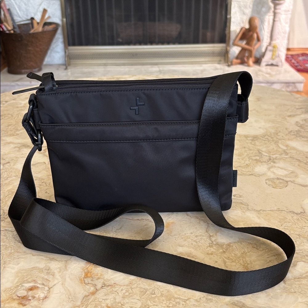 NWOT Tracker Anti Theft RFID Black Nylon Crossbody Bag Unisex